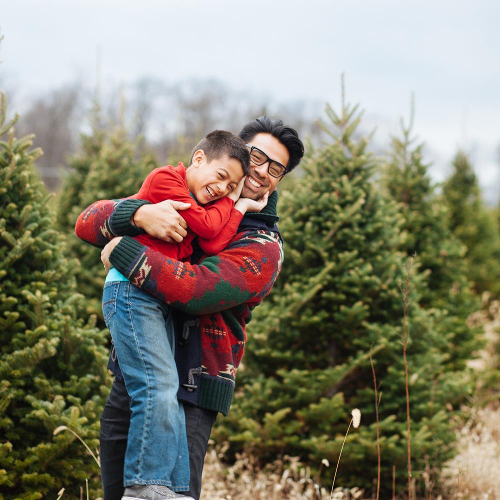 A father and son hugging