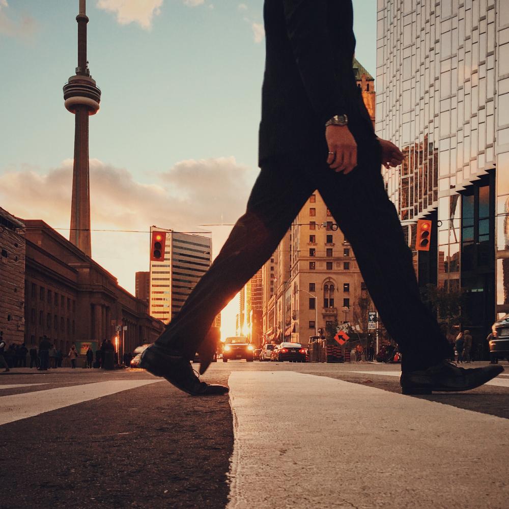 A business man walking through Toronto